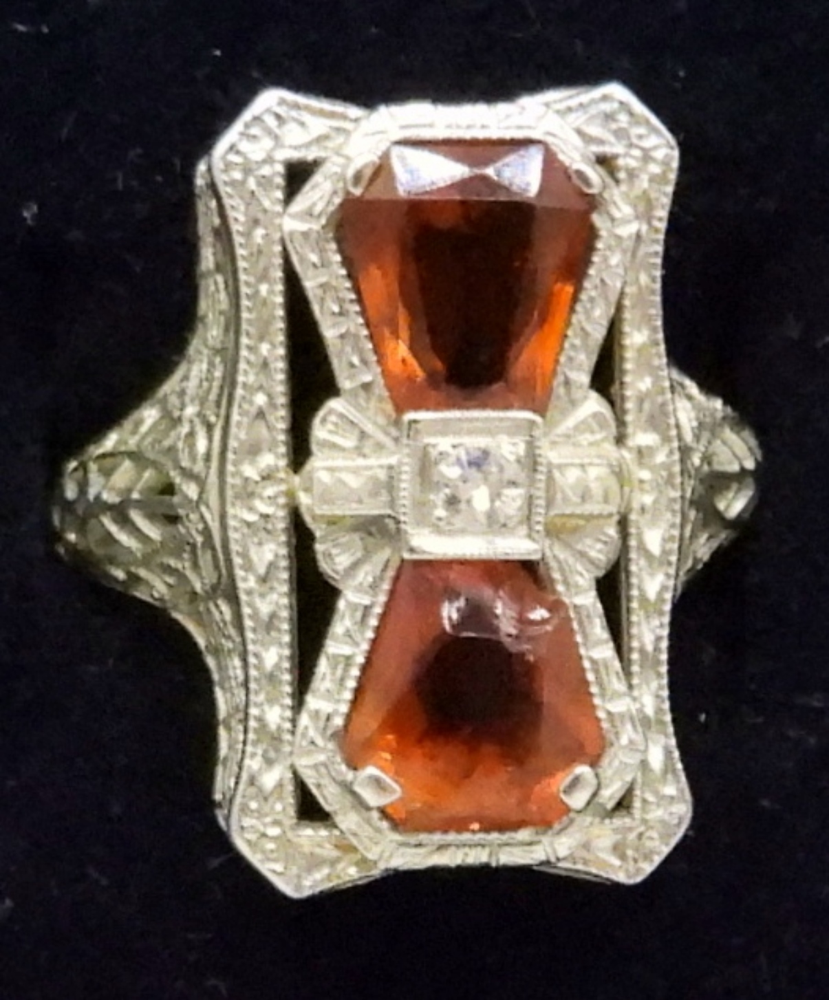 Ornate vintage ring with deep orange gemstones and diamond accent featured in our Christmas in July Jewelry Auction.