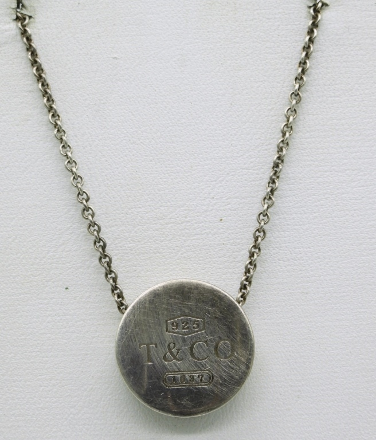 Tiffany & Co 925 sterling silver concave circle necklace at gold and silver jewelry auction